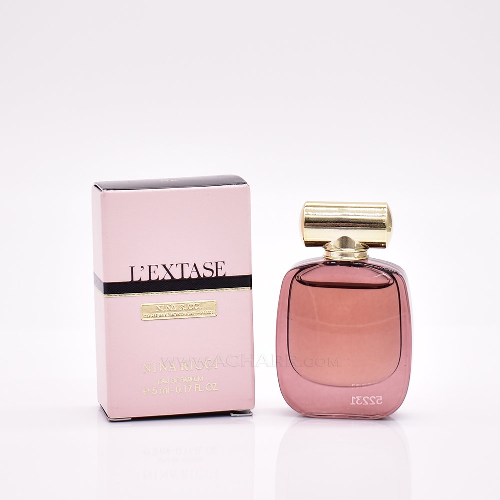 Парфюмерная вода nina ricci l extase. Нина Ричи Эль экстаз. 10. L’Extase от Nina Ricci. Духи Нина Риччи экстаз. Нина Риччи экстаз оригинал.